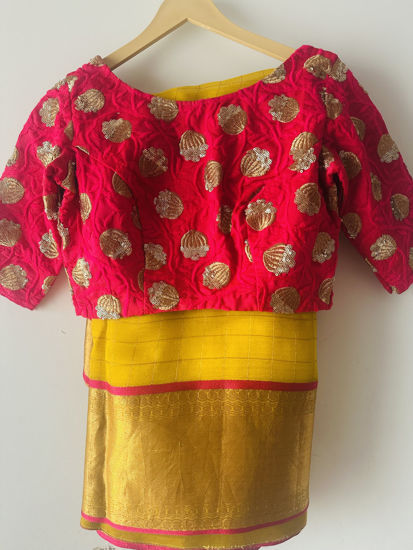 Picture of Yellow organza saree with contrast pink kora border