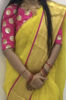 Picture of Yellow organza saree with contrast pink kora border