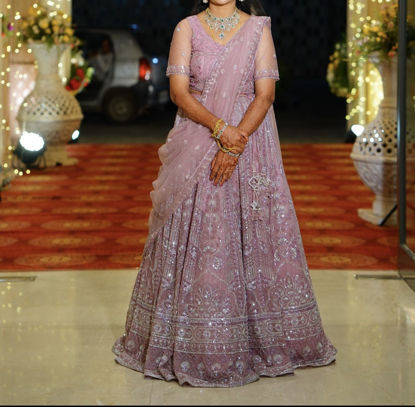 Picture of Onion pink lehenga with two blouses