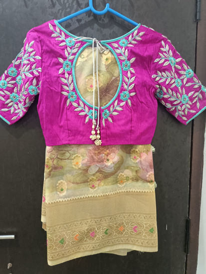 Picture of Fancy organza saree with two blouses