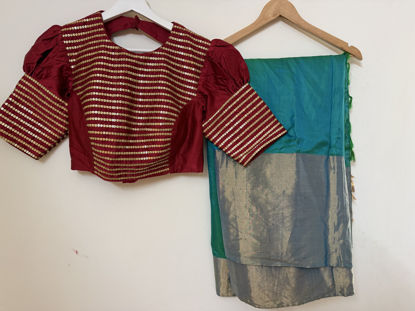 Picture of Beautiful silk kalnetha green saree with contrast designer blouse