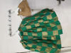 Picture of Green silk checked lehenga with gold tissue halter neck blouse For 4-6Y