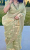 Picture of Organza pista green saree with high neck blouse