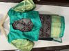 Picture of Brown with sea green combination kanchipattu saree