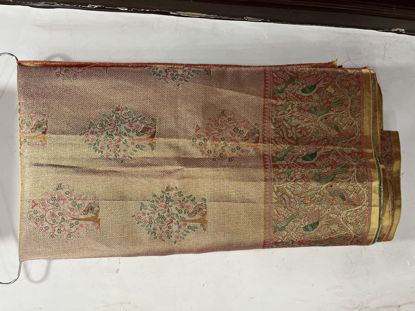 Picture of Tissue saree with gold and green combination