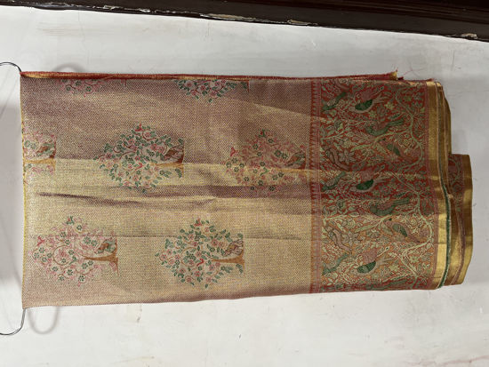 Picture of Tissue saree with gold and green combination