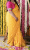 Picture of Yellow chiffon saree with pink work blouse