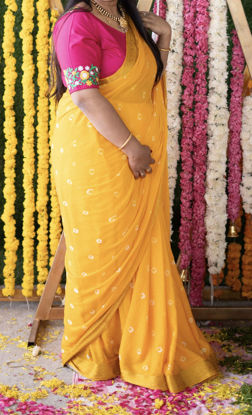 Picture of Yellow chiffon saree with pink work blouse