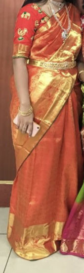 Picture of Pure kanchipattu red saree with maggam work blouse