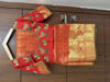 Picture of Pure kanchipattu red saree with maggam work blouse