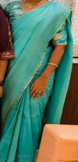 Picture of Soft tissue saree with designer blouse
