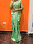 Picture of Green tissue saree with mahanati blouse