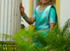 Picture of Semi pattu saree with maggam work blouse