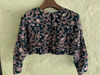 Picture of Purple Ruffle Lehenga with Green Heavy embroidered full sleeve Blouse