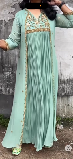 Picture of Beautiful coat style light green color  full length dress with yolk work
