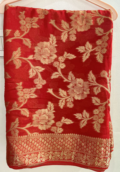 Picture of Red zari woven georgette saree