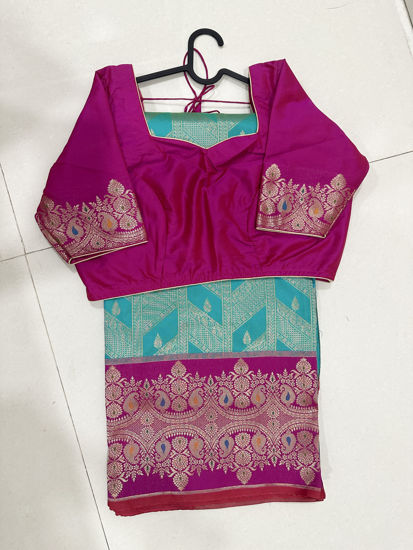 Picture of Never worn Banarasi bright seagreen pink festive saree