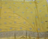 Picture of Bright Yellow saree with nice silver zari and circular lace border