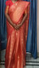 Picture of Peach and red Pattu saree