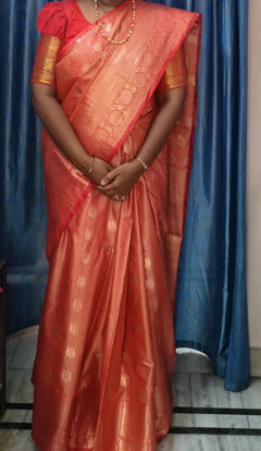 Picture of Peach and red Pattu saree