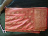 Picture of Peach and red Pattu saree