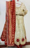 Picture of Ivory lehanga with red bhandej duppata