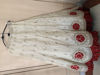 Picture of Ivory lehanga with red bhandej duppata