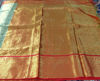 Picture of Sea green and red pattu saree