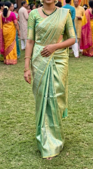 Picture of Green tissue saree with mahanati blouse