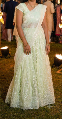 Picture of Pastel green reception party look lahenga