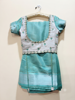 Picture of Semi pattu saree with maggam work blouse
