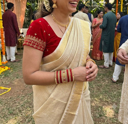 Picture of Golden tissue saree with multi use blouse