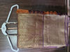 Picture of Rust orange and brown Saree